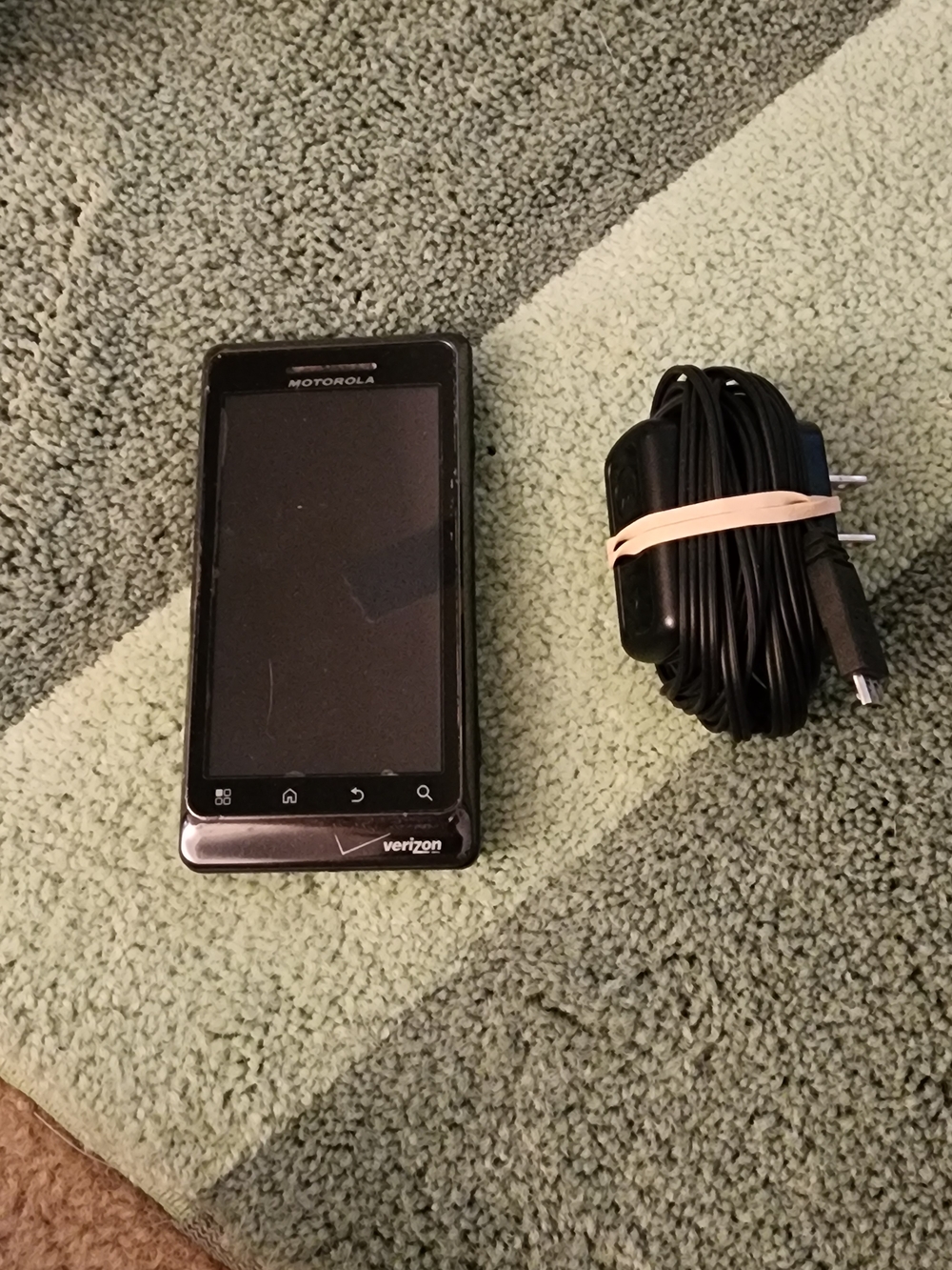 Motorola Black Smartphone with Black Charger and Cable Bundle